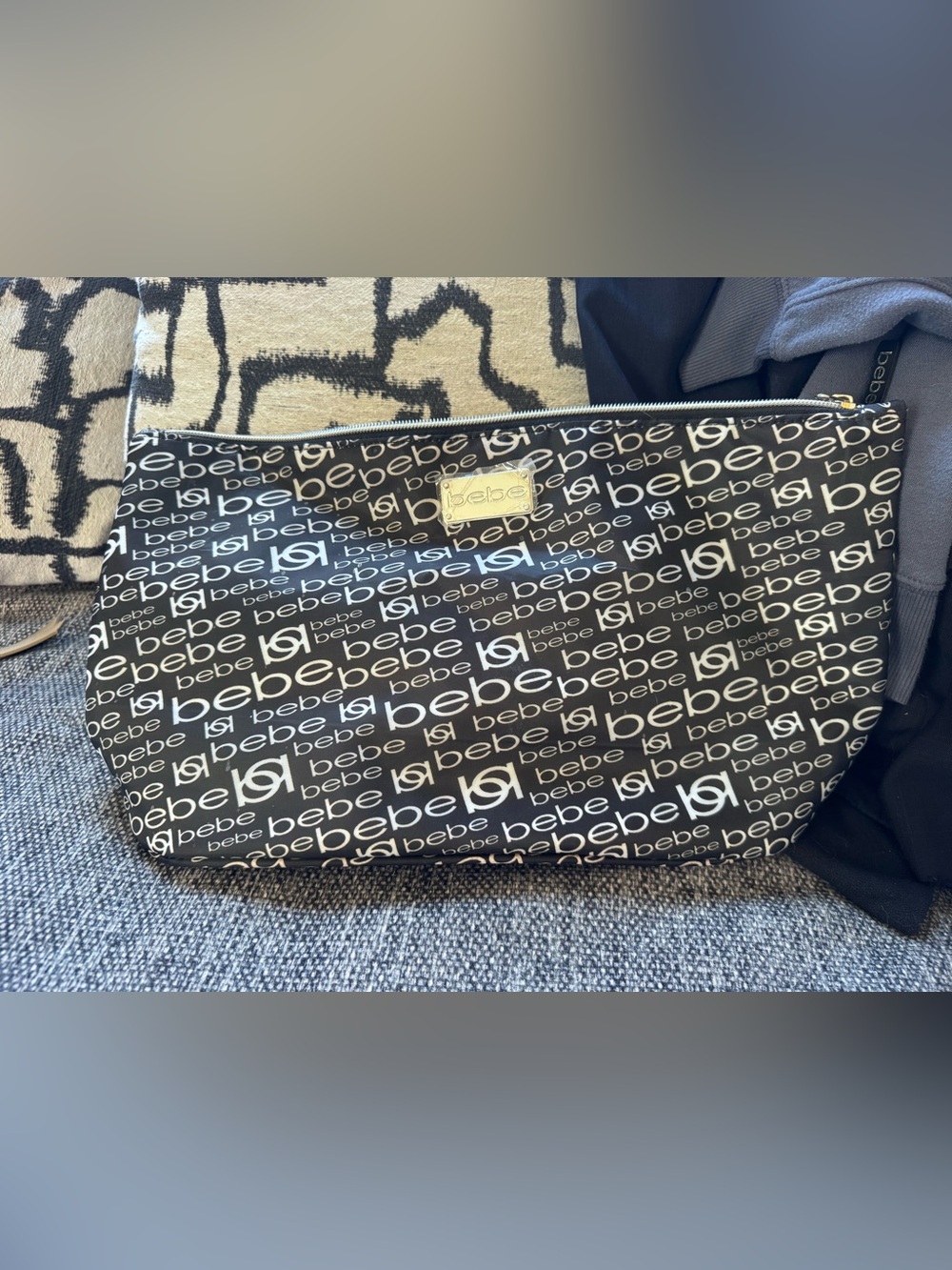 bebe Black and White Logo cosmetic Bag with Gold Plaque